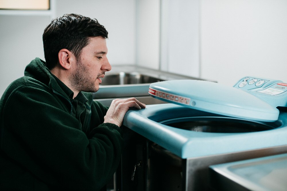 DDC Dolphin Engineer Servicing Bedpan Washer